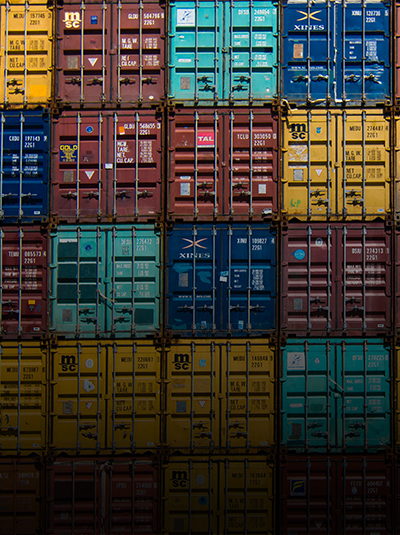 stacked-shipping-containers-content-distribution-banner