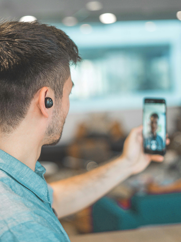 Man recording himself with smart phone